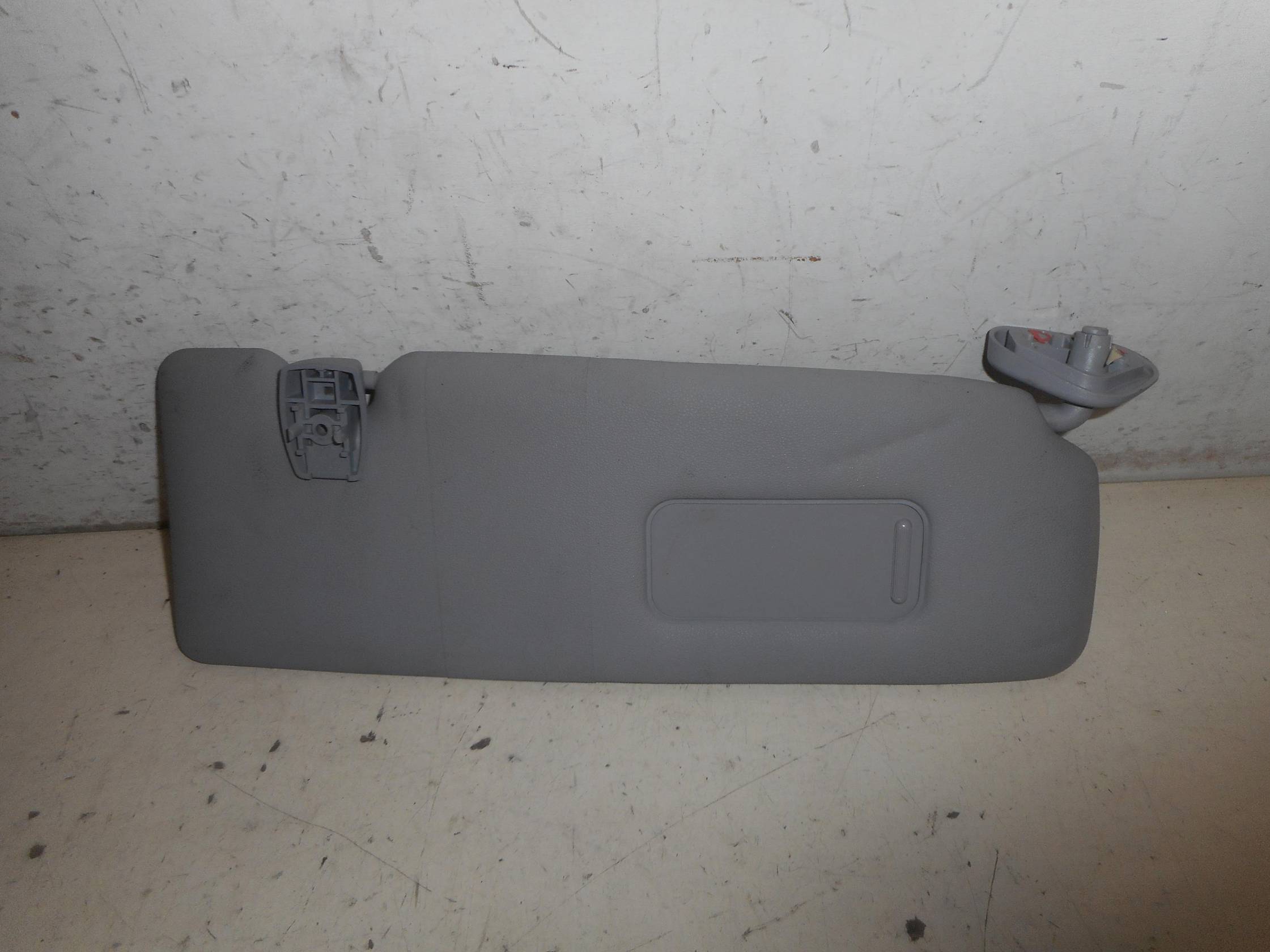 Aletta parasole parabrezza dx.